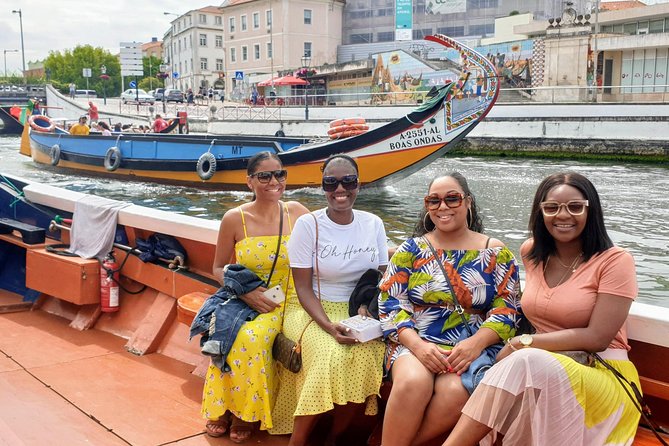 Aveiro Small Group Tour with Typical Boat Ride, offer wine bottle - Ria de Aveiro by traditional moliceiro boat: the star segment