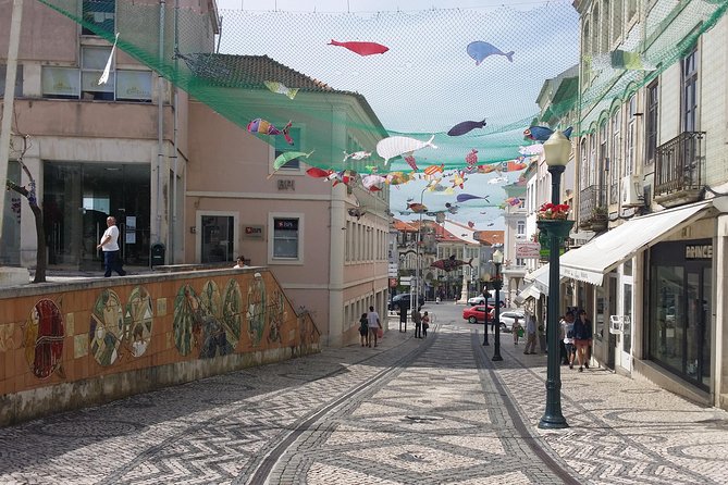 Aveiro Small Group Tour with Typical Boat Ride, offer wine bottle - Barra’s Farol da Barra: quick coast views with real payoff