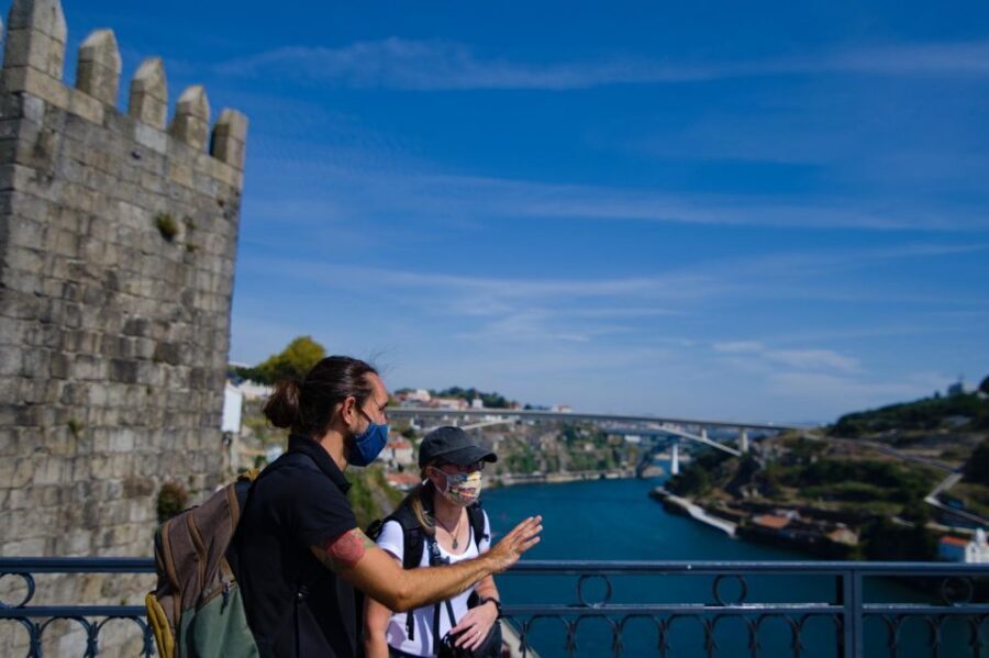 Discover Porto - A Private Walking Tour w/ Authentic Tasting - Mercado do Bolhão to Livraria Lello: market energy and bookish Porto