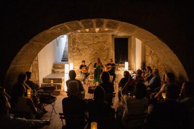 Entrance to The Fado House in São João Novo - The venue vibe: acoustics, curved ceiling, and an intimate concert