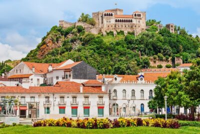 Leiria Walking Tour: History, Culture, & Local Charm - Jardim Luís de Camões: A shaded reset with sculptures and fountains