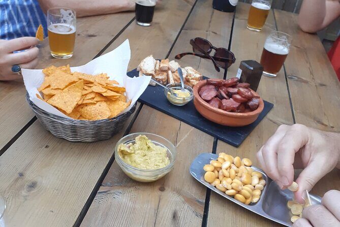 Porto: Craft Beer Tasting Tour with Local Snacks - Stop 3: Letraria Porto Downtown and the final four pours (about 1 hour)