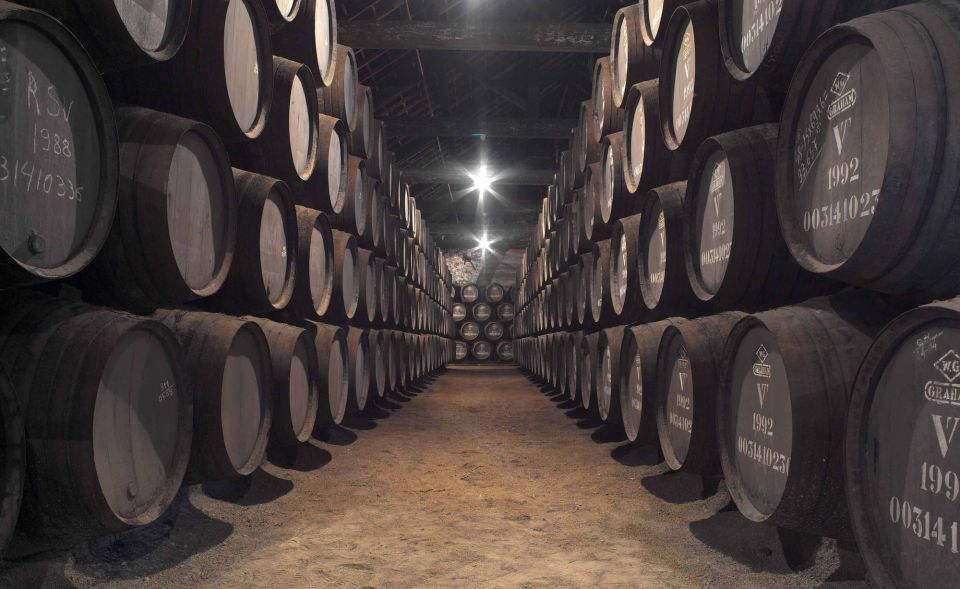 Porto: Graham's Port Lodge Tour with Premium Wine Tastings - Graham’s Port Lodge: the 1890 cellar view from Gaia