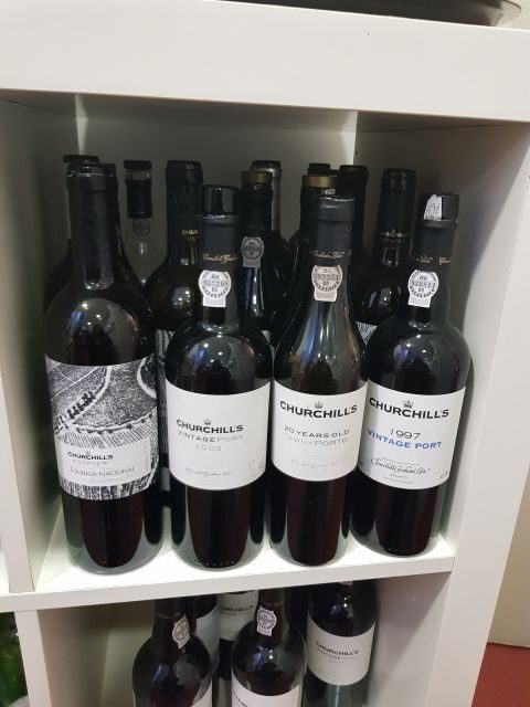 Porto: Port and Douro Wine Walking Tour with 9 Tastings - Stop 3: Solar dos Dragos and the Douro wine contrast