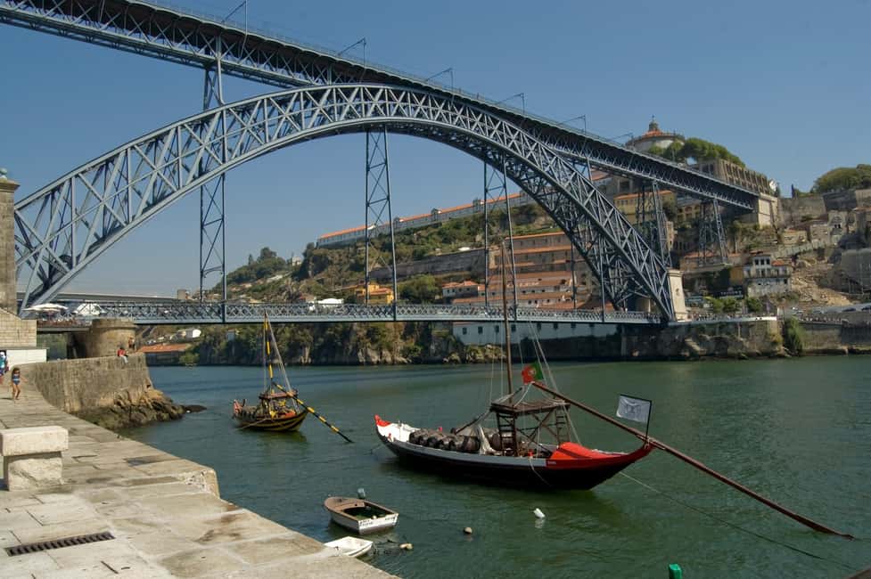 Porto Private Tour - Highlights and Tram Tickets - Ribeira and Porto’s historic center walk: bridges, cafés, and street-level charm