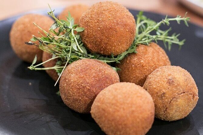Semi - Private Oporto Food Tour - Rua das Flores: nata in a pedestrian street with centuries behind it