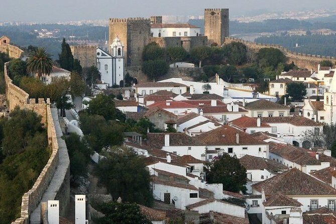 Tour / transfer Lisbon - Porto or Porto Lisbon with tour - Porto–Lisbon With Aveiro, Coimbra, and Fatima on the Way